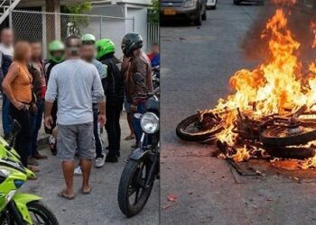 Presunto atracador se salvó de ser linchado por la comunidad en el barrio Galán, Barranquilla: le quemaron la moto